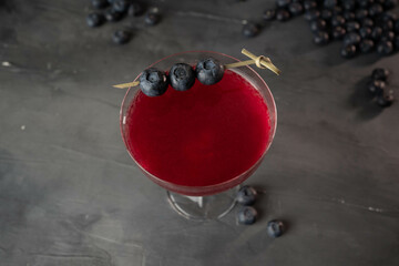 Fresh berries cocktail with bluenerries. Summer cold drink and cocktail.