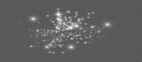 The dust sparks and golden stars shine with special light. Vector sparkles on a transparent background. Christmas light effect.