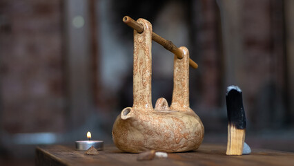 Tea ceremony. Palo Santo incense, clay teapot, candle.