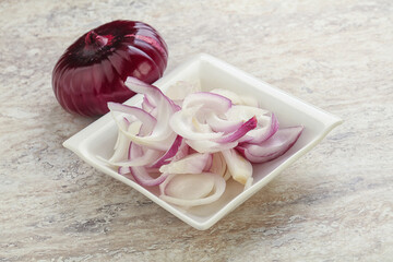 Sliced red onion in the bowl