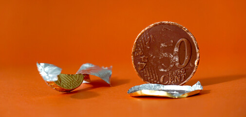 Chocolate coin. sweet euro money .finance and sweet food theme