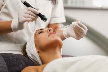 Woman On A Facial Treatment At The Beauty Salon