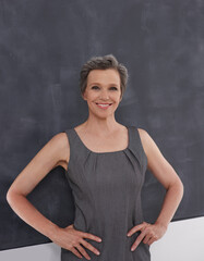 Make each day your masterpiece. Portrait of a confident mature businesswoman standing with her hands on her hips.