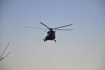 Rijeka 14.2.2023. Croatia.Military helicopter maneuvers in the blue sky. Air force Mil Mi-171Sh in...