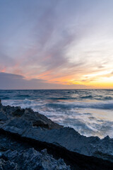 Fototapeta premium Island scenery, Cap de Ses Salines cloudy sunset on Majorca, Spain Mediterranean Sea