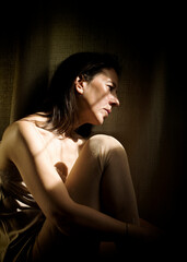 portrait of a woman between lights and shadows VIII