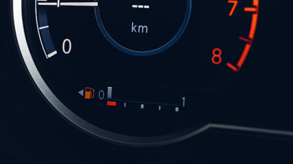 Empty fuel warning light in car dashboard. Fuel pump icon. gasoline gauge dash board in car with...