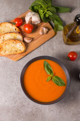 Tomato soup with basil.  Healthy, vegan and dieting lunch and dinner concept. Gazpacho. 