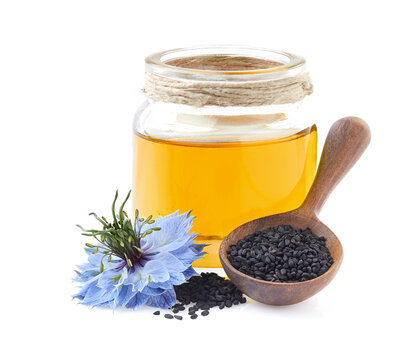 Black cumin oil on white background