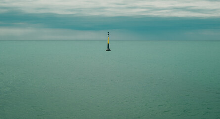 Fototapeta premium sea buoy on middle 