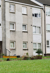 Fototapeta na wymiar High rise council flats in poor housing estate with many social welfare issues in Maryhill, Glasgow