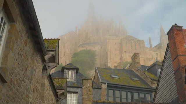 Foggy Morning at the famous Le Mont Saint-Michel tidal island , Normandy, France