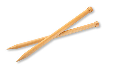 A pair of large wooden knitting needles