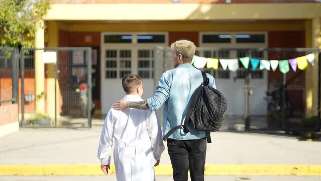 Father leaving his son at public school in Argentina