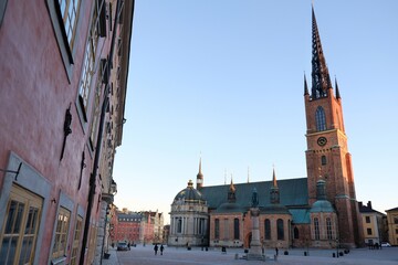 Obraz premium Riddarholmen Church, located on Riddarholmen Island, next to the Royal Palace in Stockholm, Sweden. The only surviving medieval monastery church in Stockholm. Sweden