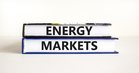 Energy markets symbol. Concept words Energy markets on books. Beautiful white table white background. Business energy markets concept. Copy space.