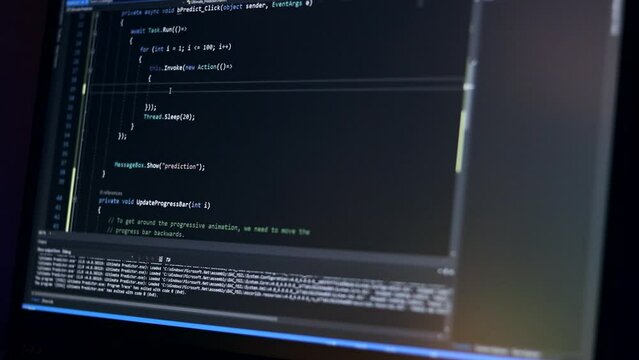 The programmer is busy working with the latest innovative complex technological display application with augmented reality holograms to implement a new code project. writing program code for the