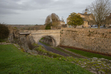 Fototapeta na wymiar The Bridge from town to the castle of Domfront in Normandy, France