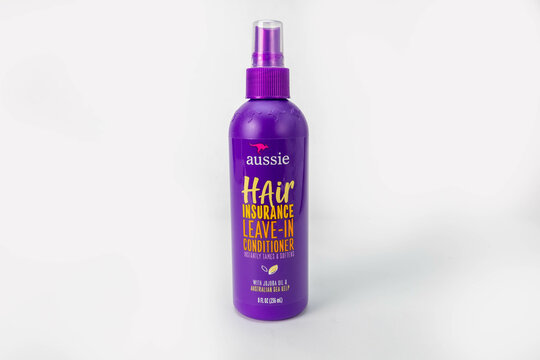 Fort Myers, FL, USA - 3-1-23: Aussie Hair Insurance leave-in Conditioner isolated on white background. 