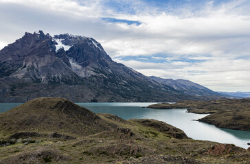 Impressive mountains and a lake with turquoise water at Torres del Paine National Park in Chile, Patagonia, South America