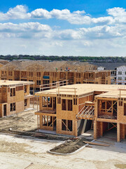 New Apartment Building Complex Progress: Workers Constructing the Roof - Vertical