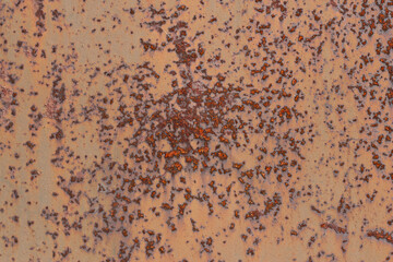rusty metal background - a close up of a rusted metal surface with a large circle of rust