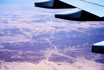 view of an airplane on the Sahara Desert