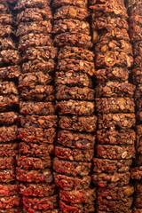 Oat and corn flakes cookies. Healthy natural food. Rows are stacked on top of each other. Vertical photo.