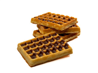 Chocolate waffles isolated on white background. Waffles in chocolate. Close-up.