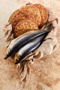 Catholic still life of five loaves of bread and two fish