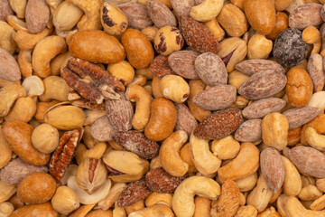 A group of almonds, pistachios, walnuts, macadamia, cashews.