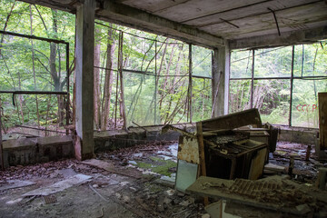 Shop is Chernobil. radioactive vehicles graveyard in Chernobyl, summer season in exclusion Zone,...