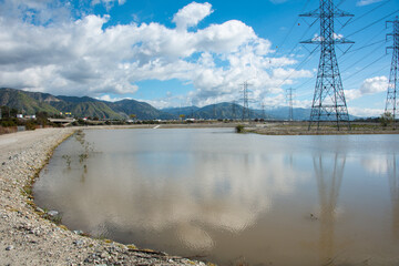 Fototapeta na wymiar Santa Fe Dam Irwindale, CA - california reservoir at full level