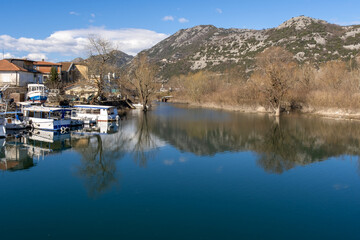 Boats on the calm water of the lake 