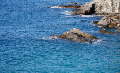 Fototapeta na wymiar Rocks in the sea along the coast