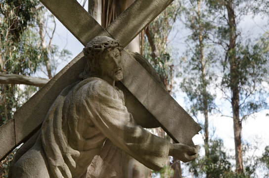 viacrucis station number two jesus carries the cross, heavier for the sins of the world