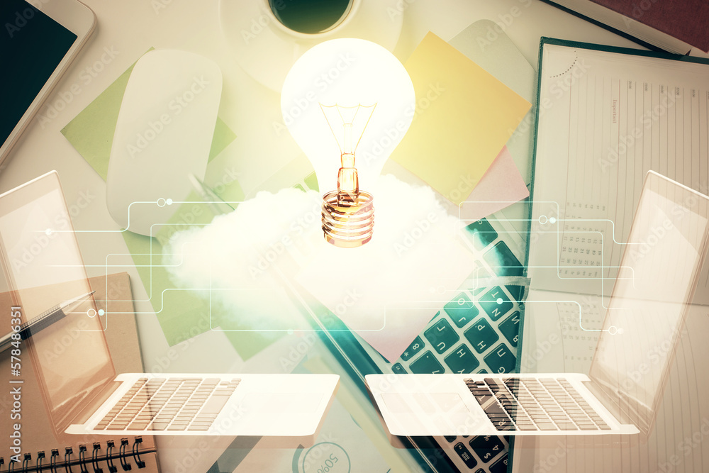 Aufkleber bulb drawing over computer on the desktop background. top view. double exposure. idea concept.