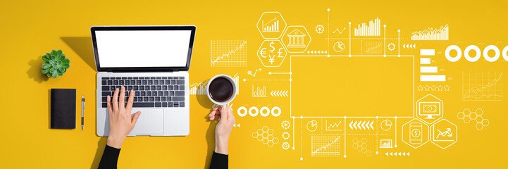 Fintech theme with person using a laptop computer