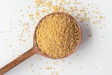 Uncooked Whole Wheat Couscous on a Spoon