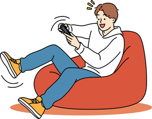 Boy relax at home playing video games