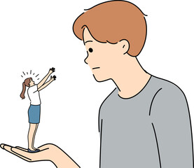 Young man hold on hand tiny woman