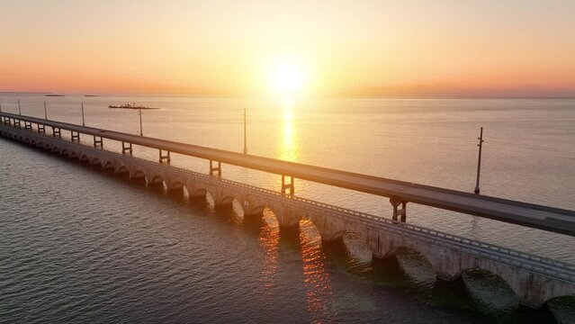 Aerial shot of the Seven Mile Bridge in Florida at sunrise. The bridge connects the Florida Keys on the way to Key West.