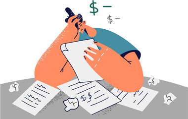 Unhappy man distressed with debt paperwork
