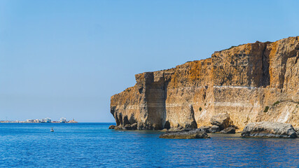 Obraz premium View of the sea and rocks. Blue sea, blue sky and good climate. High image quality. High quality photo