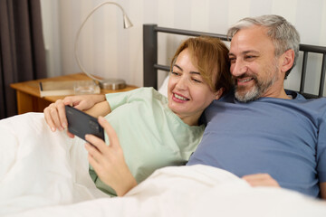 Capturing moments of love with mobile phone at home