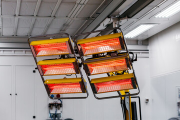 Infrared lamps for drying of car body parts after applying save gloss coating