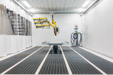 Painting and drying under lamps in professional box of car body parts after applying putty and paint