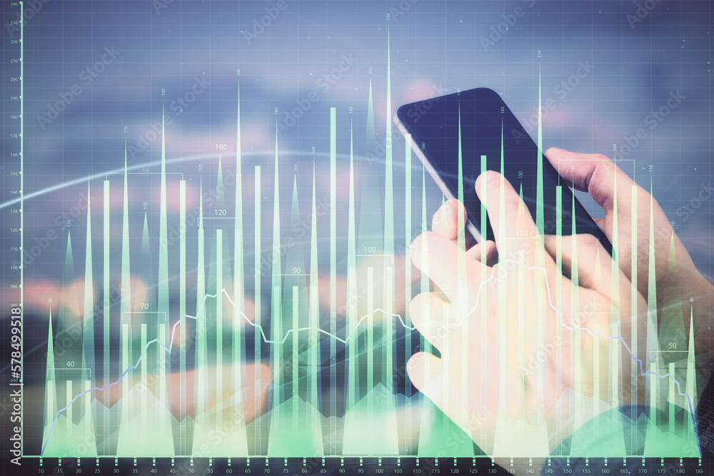 Poster double exposure of man's hands holding and using a digital device and forex graph drawing. financial