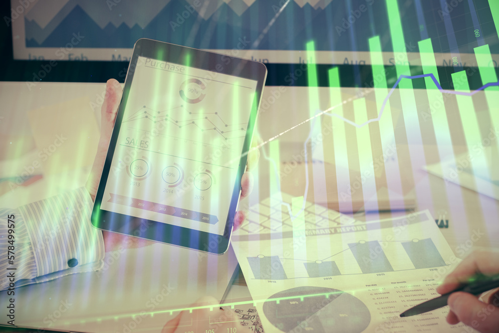 Poster double exposure of man's hands holding and using a digital device and forex graph drawing. financial