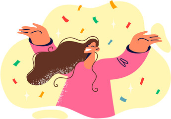 Positive woman raising hands rejoicing with festive confetti during birthday or christmas party